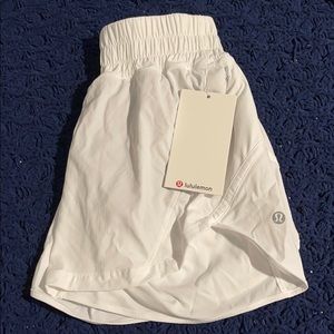 white lululemon tracker shorts